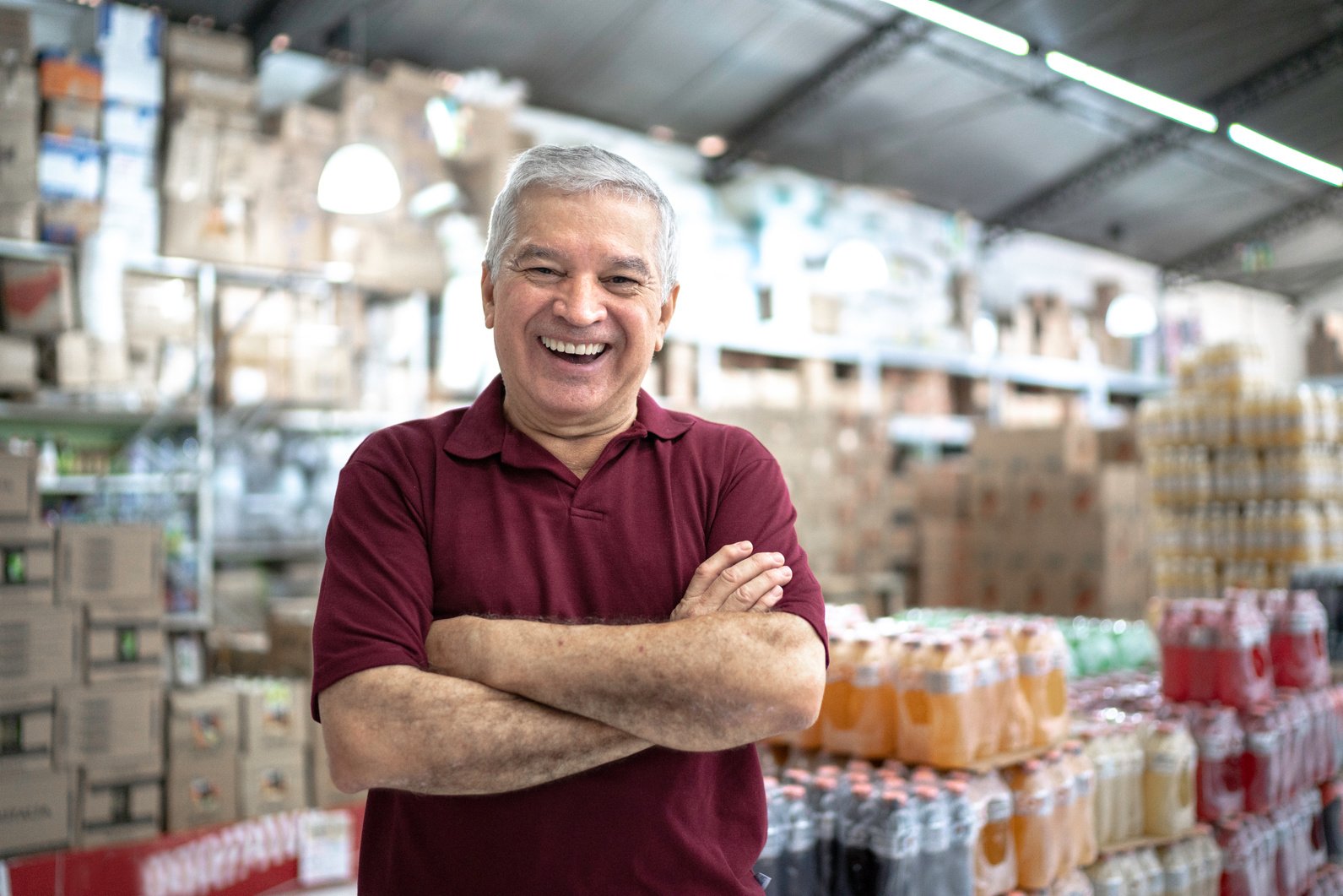 Portrait of a happy owner senior at wholesale